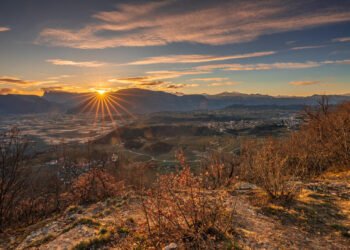 Viewpoint over Bolzano from Boymont Castle at sunrise in Eppan, Italy.