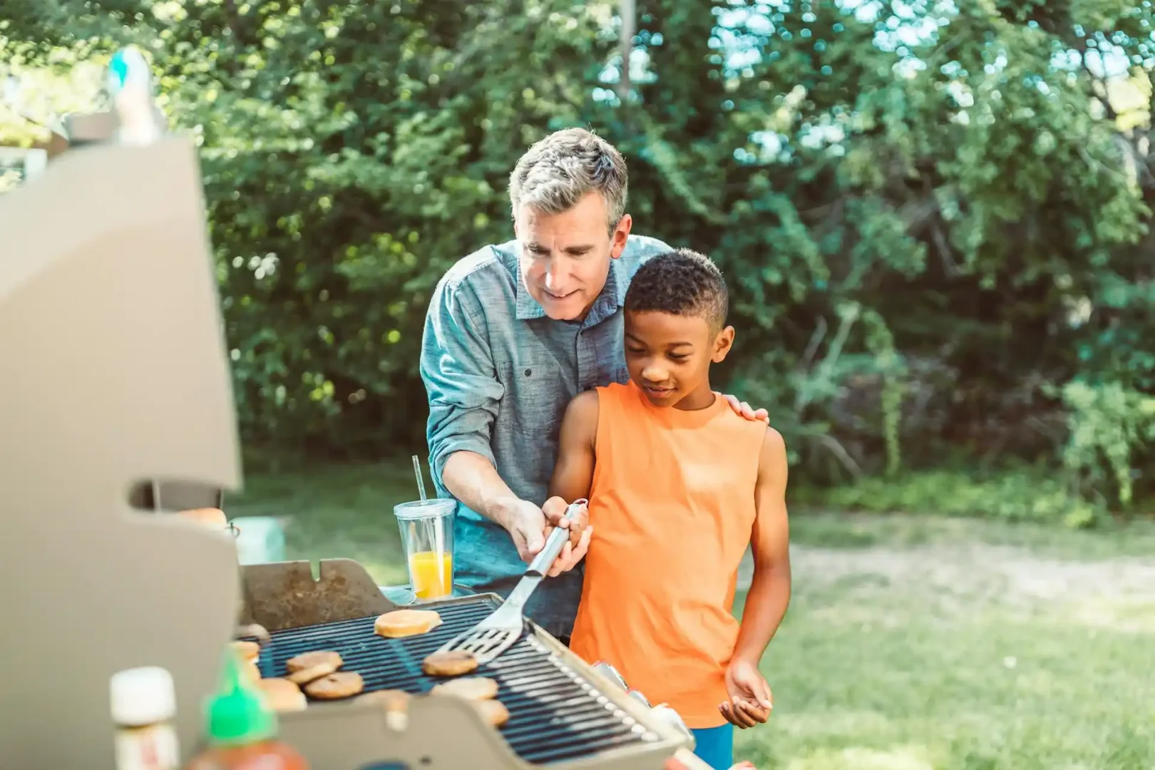 A Father and His Son Braaing - Things to do on Father's Day in Cape Town