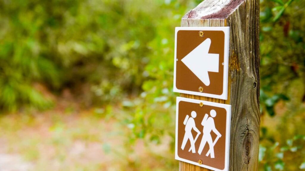 Hiking signs on trail