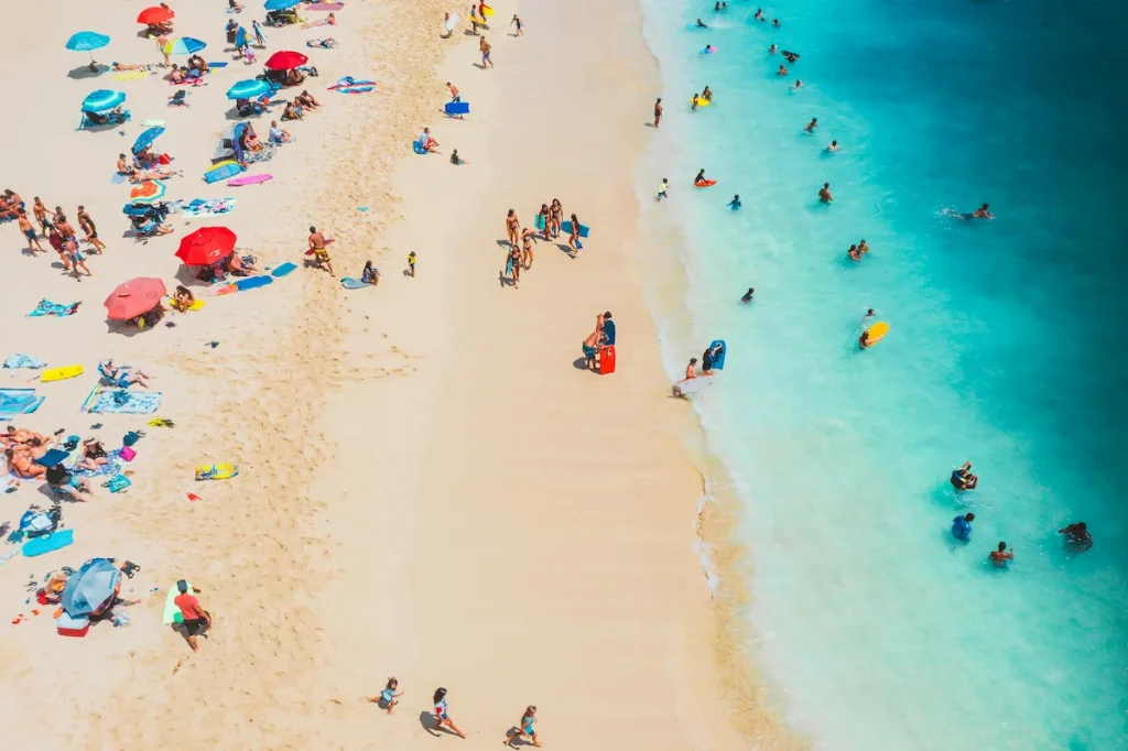 Beach Goers at Llandudno Beach - Cape Town Attractions