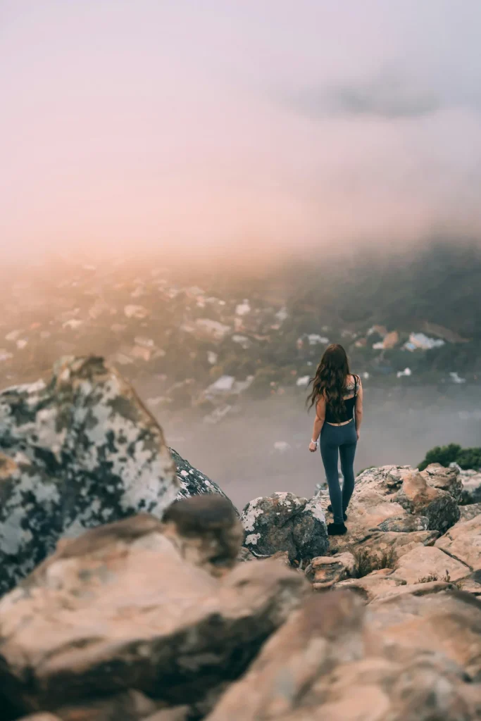 Woman Standing on the Edge of a Cliff - Hiking Lion's Head
