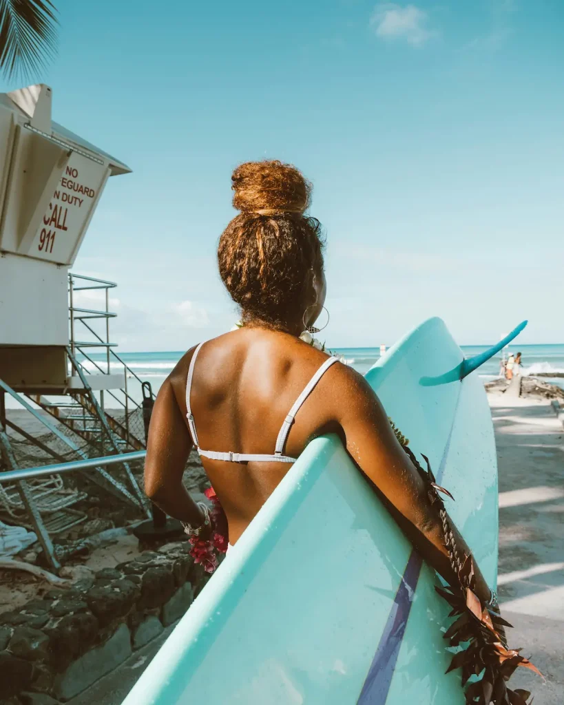 Woman with Surfboard - Muizenberg, Cape Town