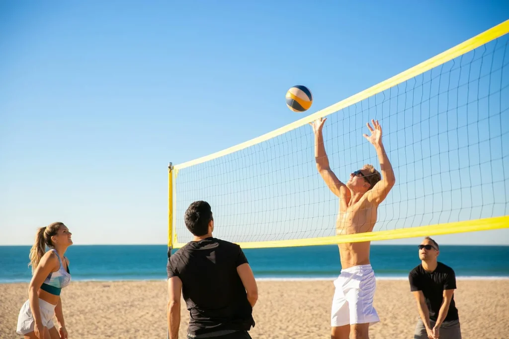 Friends Playing Volleyball - Clifton Beach Cape Town