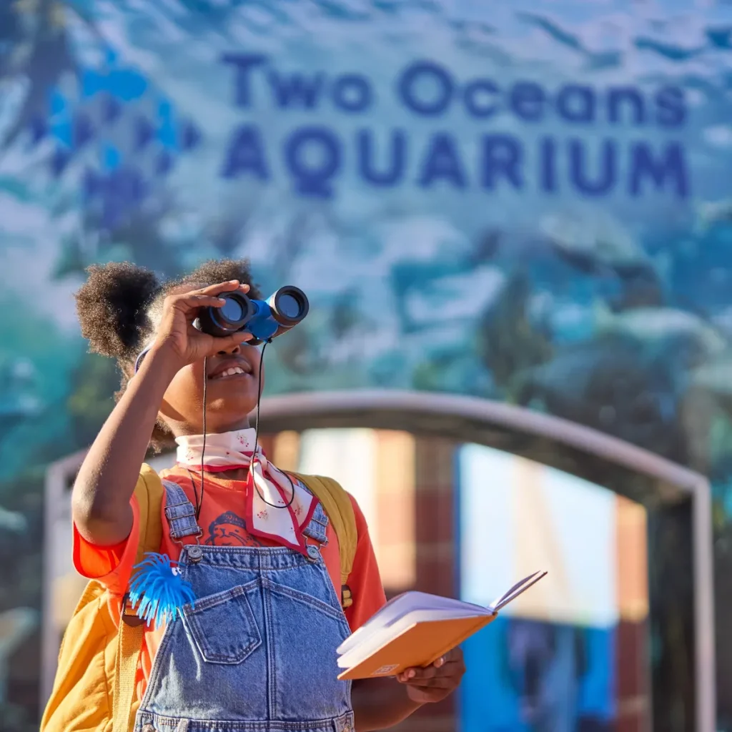 Girl with Binoculars - Two Oceans Aquarium, Cape Town