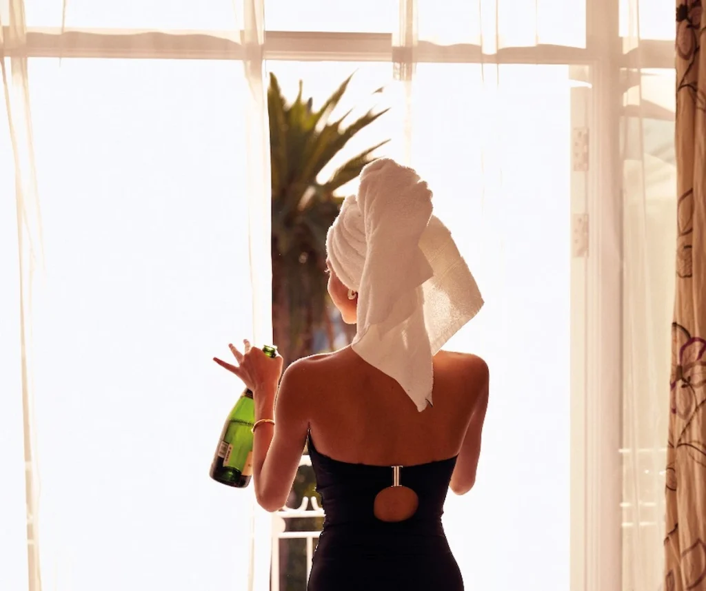 Woman and Champagne Bottle - Mount Nelson Hotel, Cape Town