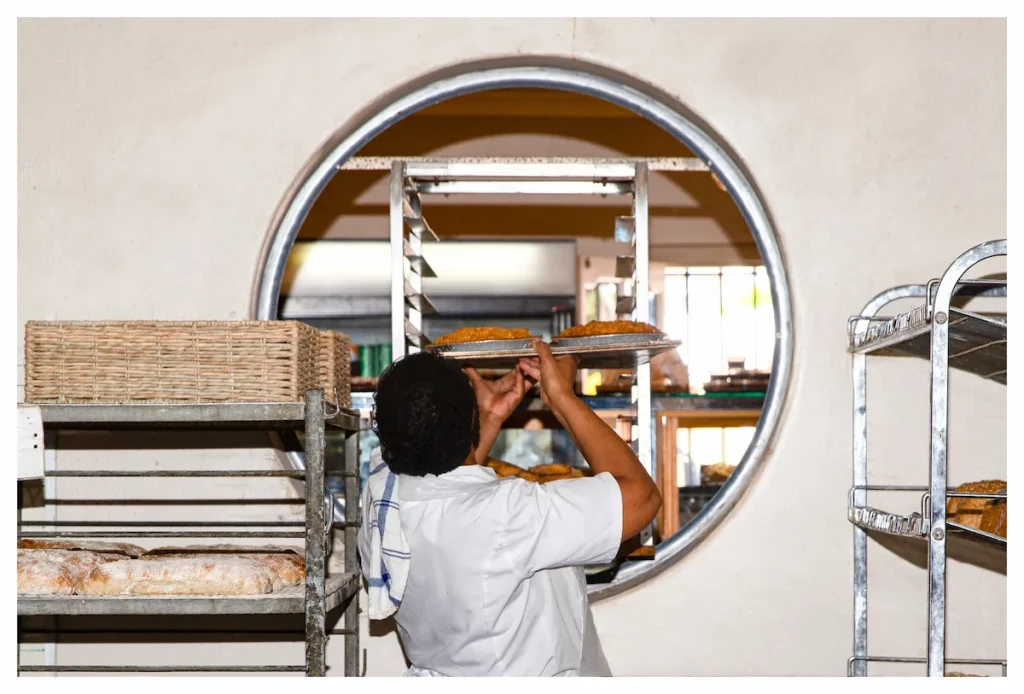 Baker at Olympia Bakery - Cape Town Attractions
