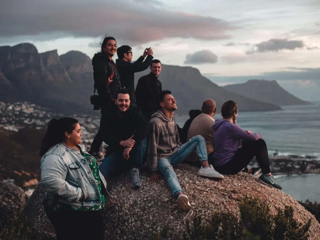 Friends Sitting on a Rock - 12 Apostles in Cape Town