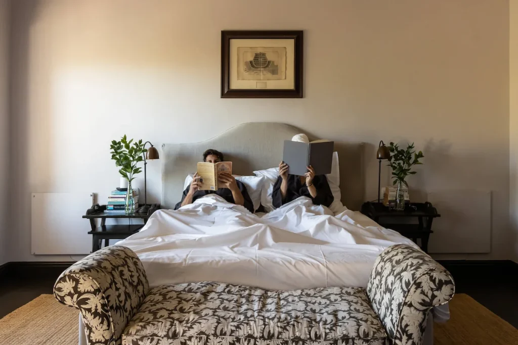 Guests in Bed at The Dorp Hotel - Bo-Kaap Cape Town 