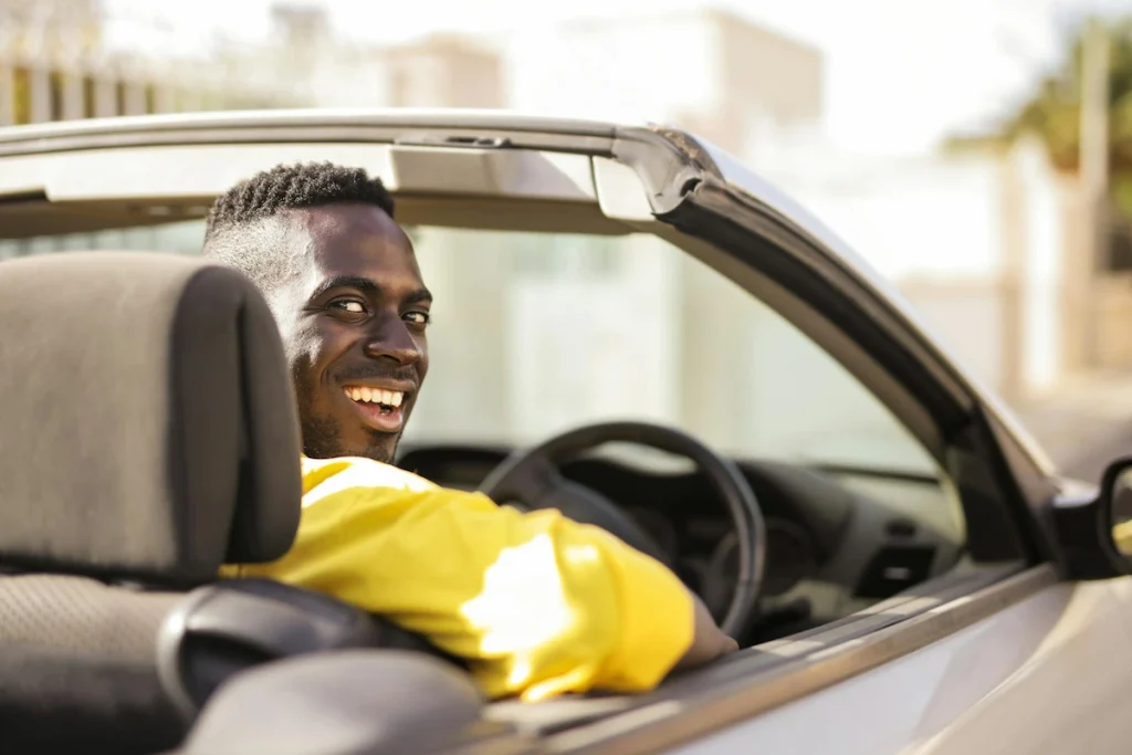 Man Driving a Luxury Car - Cape Town Road Trip