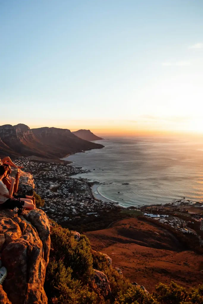 Travellers Watching the Sunset from a Mountaintop - 12 Apostles in Cape Town