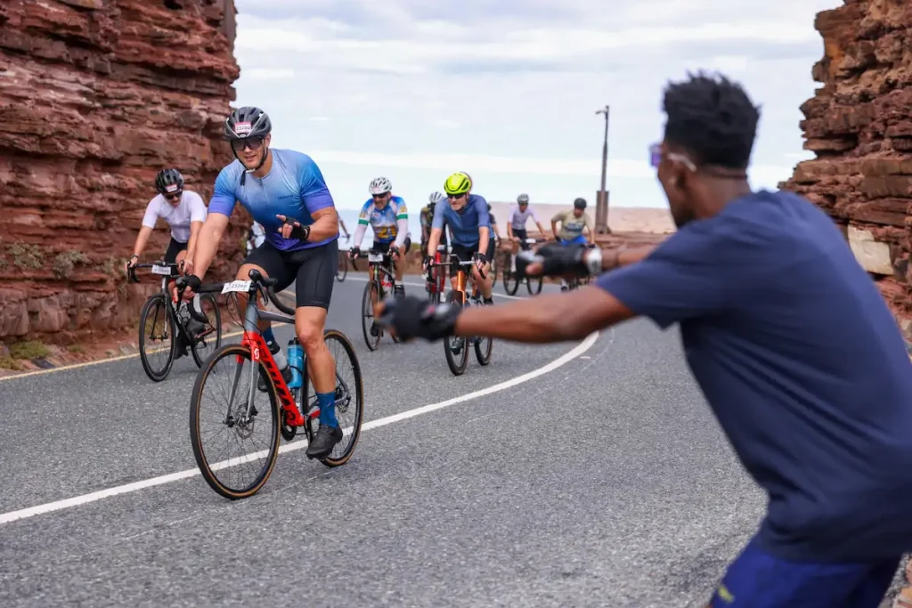 Spectator Cheering on Cyclists at the Cape Argus - Cape Town