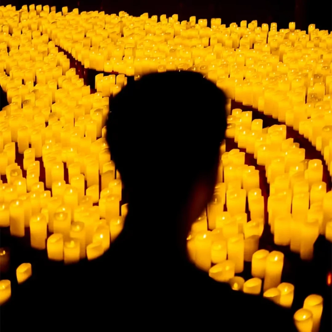 Silhouette and Candles - Candlelight: Cold Play vs. Imagine Dragons